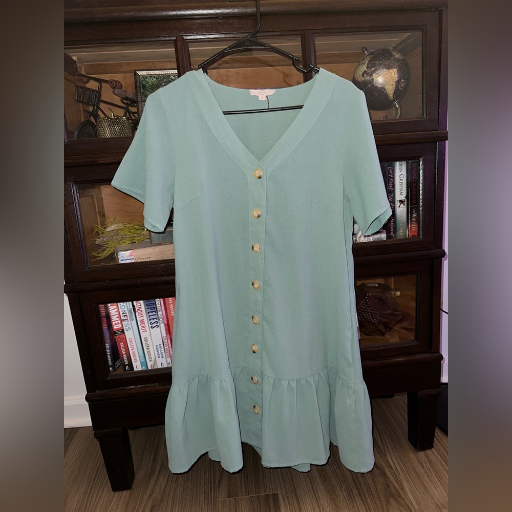 green dress with buttons